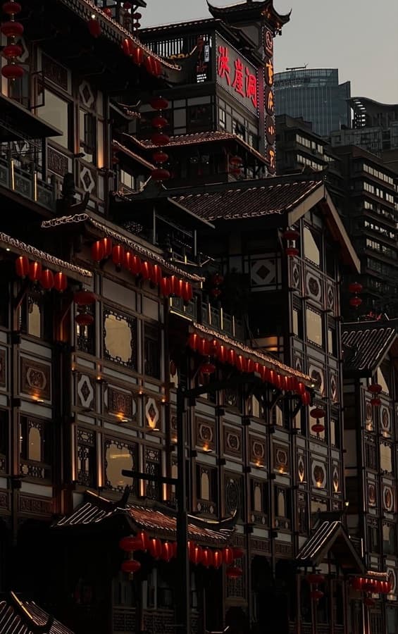 Darerca Chaw — Lantern-lit stilt houses at Hongya Cave