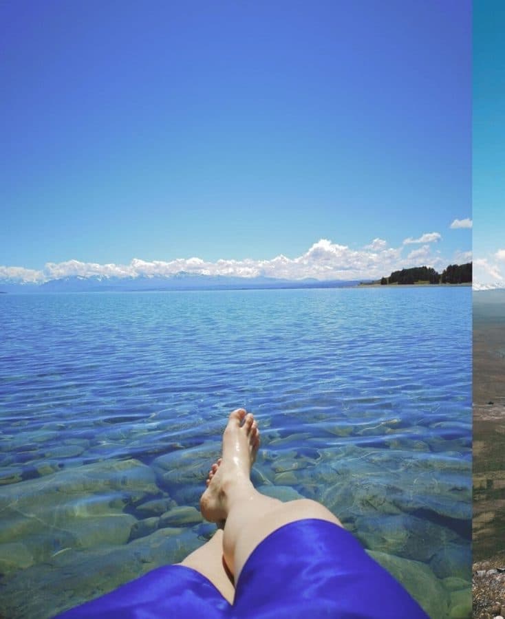 Wilson Lee — Feet up over a crystal-clear lake